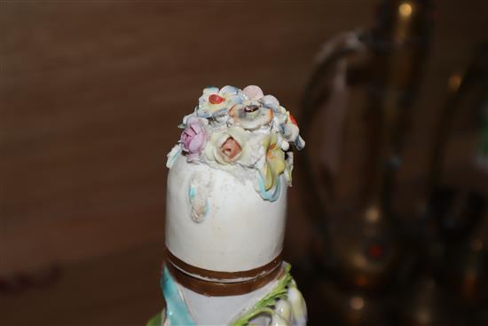 Three English porcelain flower encrusted scent bottles and covers, c. 1830-40, possibly Coalbrookdale, H. 41cm and 28cm